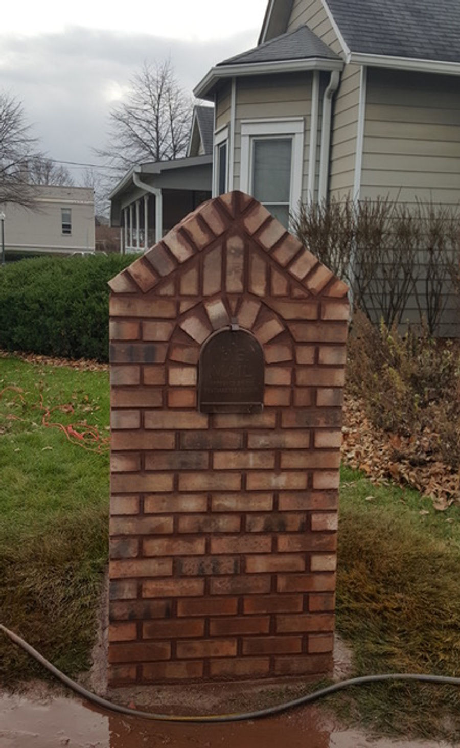 Brick mailbox column laid by Lone Wolf Masonry